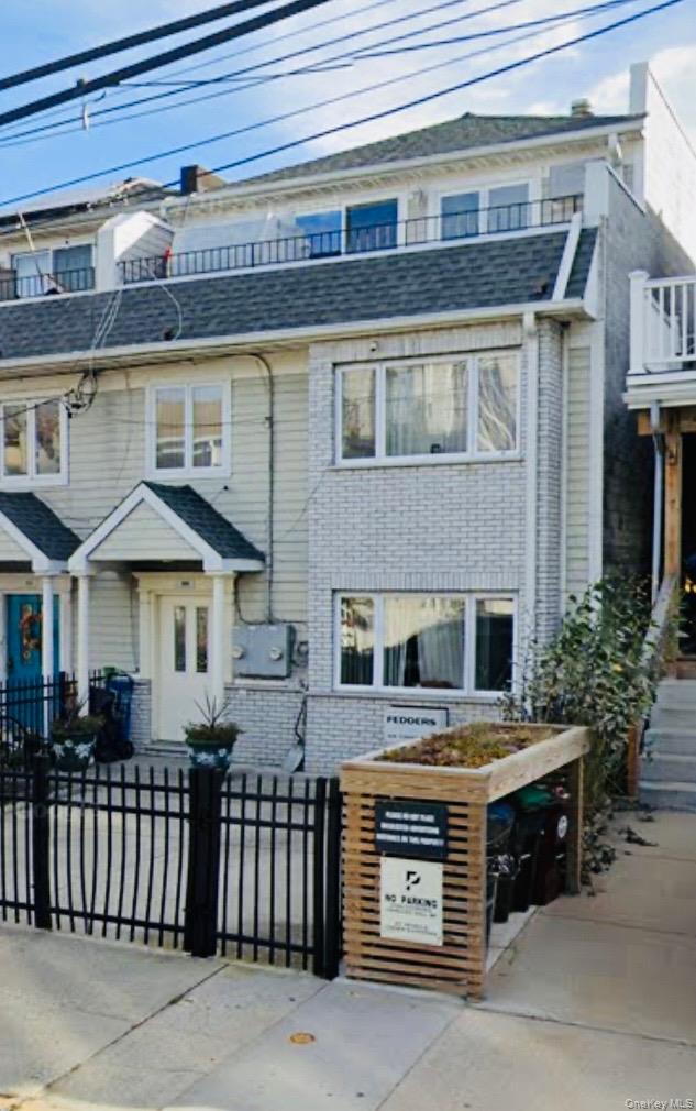 a view of a house with a balcony