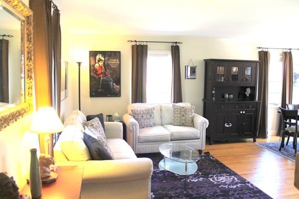 62 Pierce Road, Unit 62 Watertown, MA 02472 - Photo 1 of 14 a living room with furniture and wooden floor