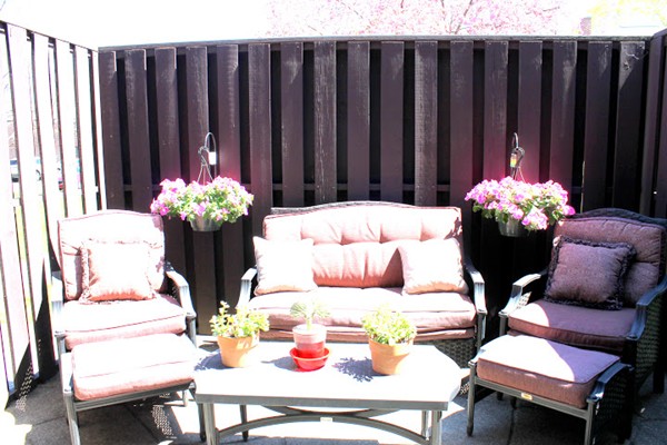 62 Pierce Road, Unit 62 Watertown, MA 02472 - Photo 11 of 14 a living room with furniture and flowers