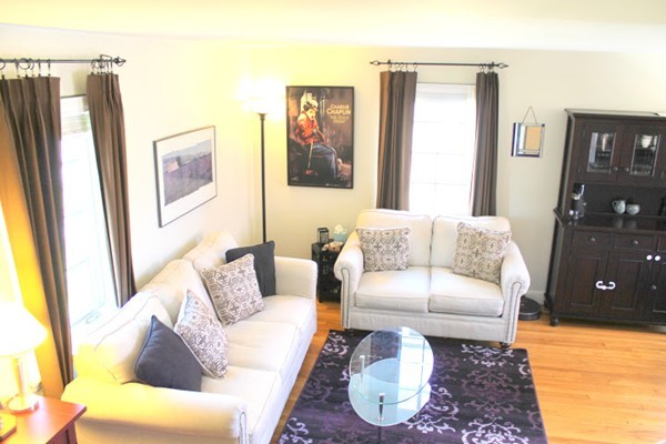 62 Pierce Road, Unit 62 Watertown, MA 02472 - Photo 2 of 14 a living room with furniture and a couch