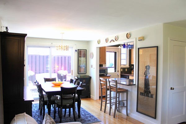 62 Pierce Road, Unit 62 Watertown, MA 02472 - Photo 6 of 14 a view of a dining room with furniture window and outside view