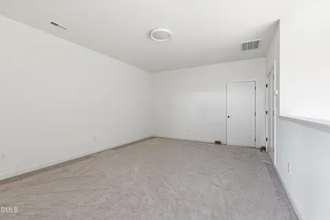 a front view of a houses on the roadside