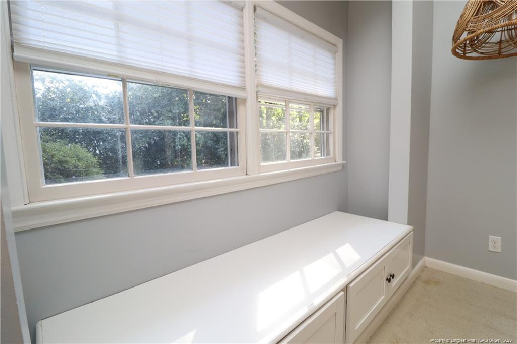 4909 Auburn Road Raleigh, NC 27609 - Photo 17 of 33 a room with a bed and a window