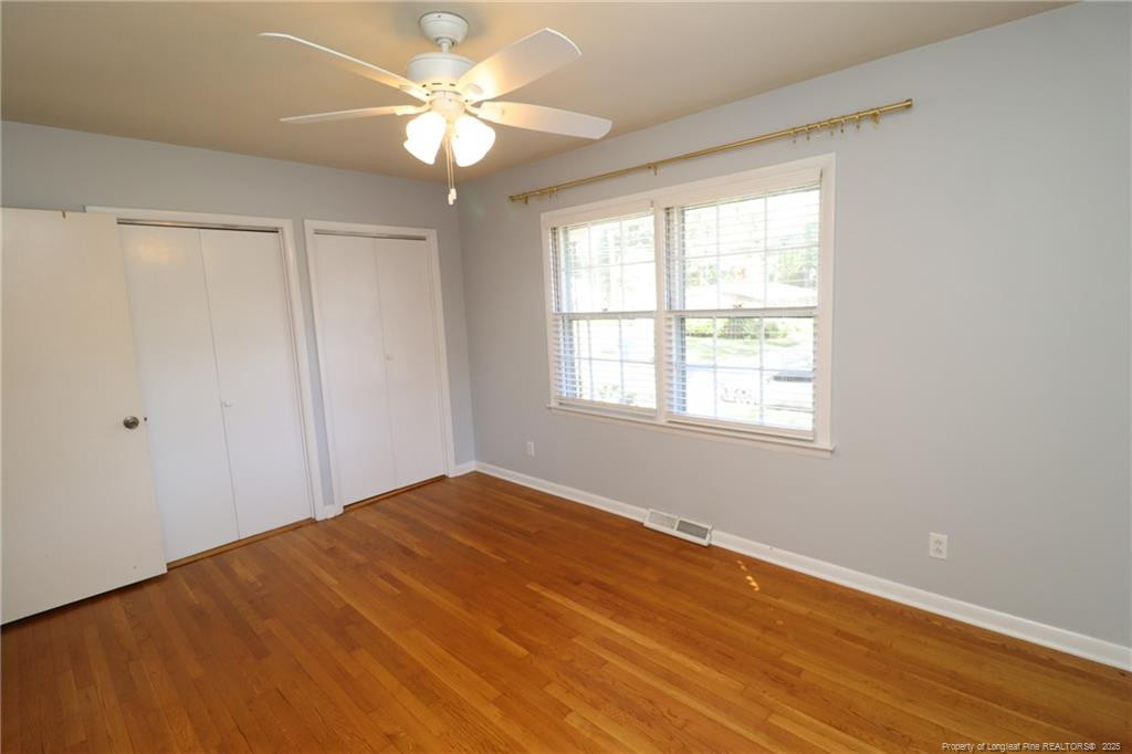 4909 Auburn Road Raleigh, NC 27609 - Photo 22 of 33 a view of an empty room with a window