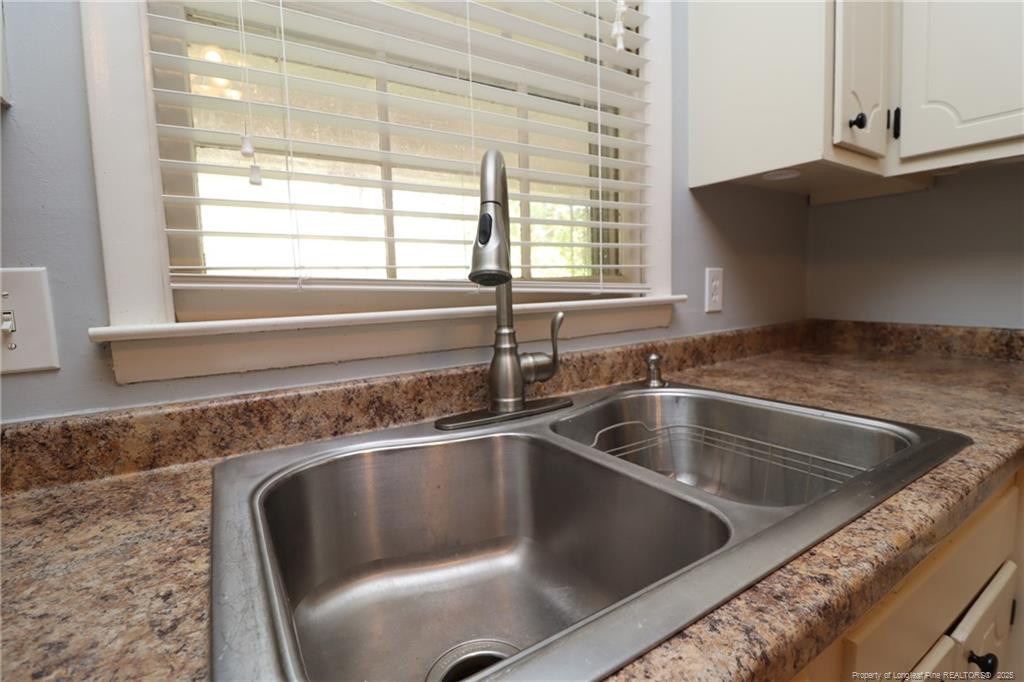 4909 Auburn Road Raleigh, NC 27609 - Photo 10 of 33 a close view of sink and tap