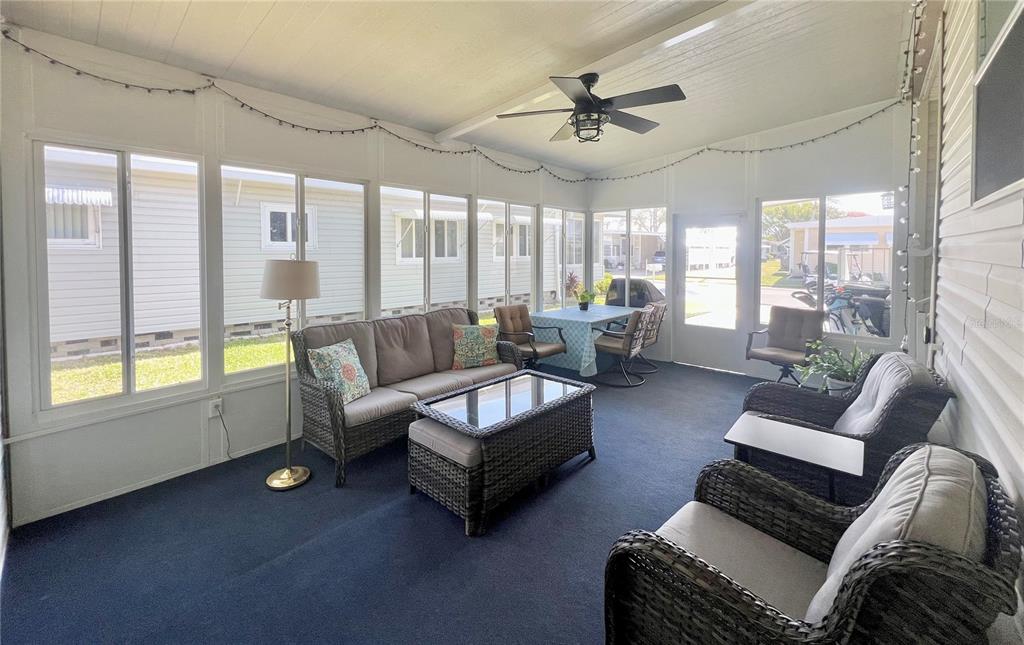 1100 South Belcher Road, Unit 512 Largo, FL 33771 - Photo 7 of 73 Lanai under carport with mini split A/C for comfort