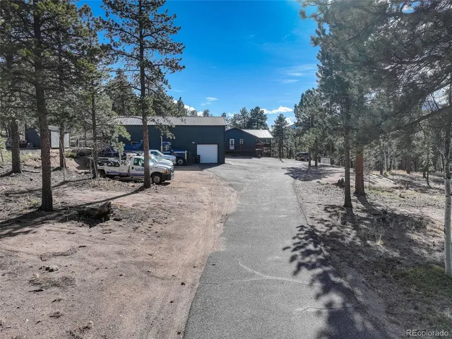 a view of road with trees
