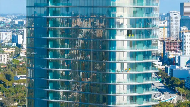 a view of fountain along the path and plants