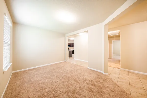 an empty room with a natural light