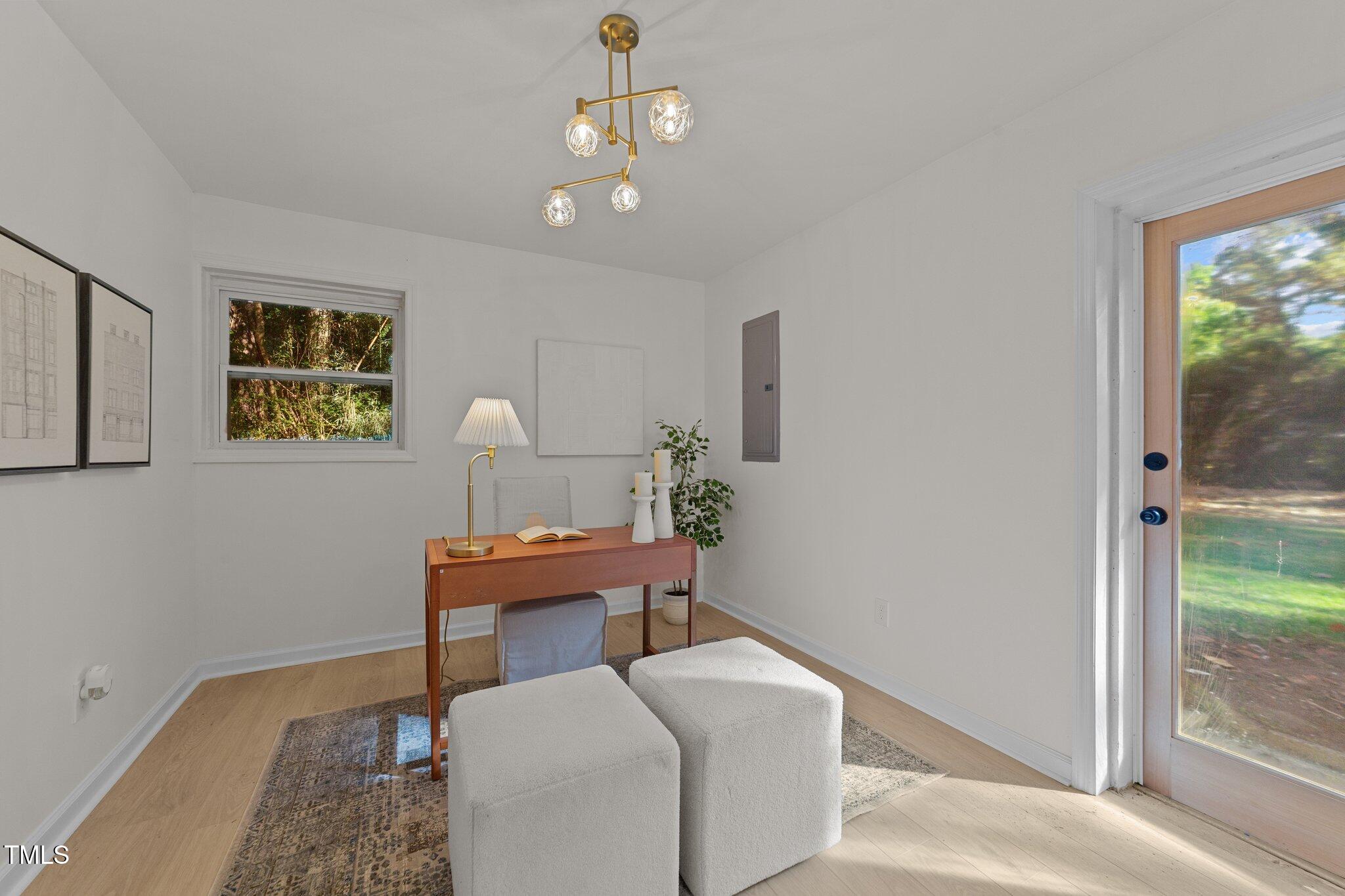 4601 Forestdale Road Raleigh, NC 27603 - Photo 35 of 46 a work room with furniture and a window