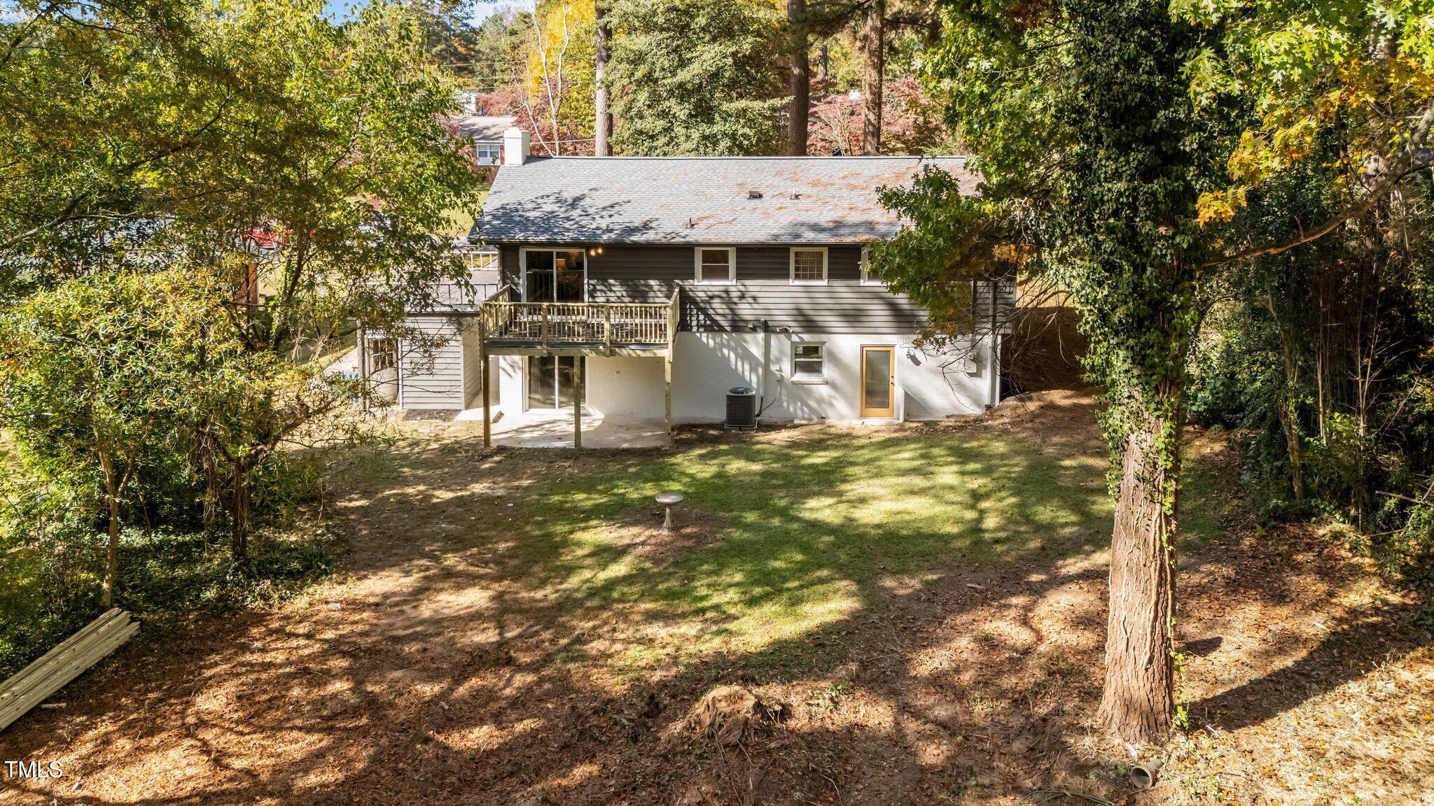 4601 Forestdale Road Raleigh, NC 27603 - Photo 39 of 46 a view of a house with a yard