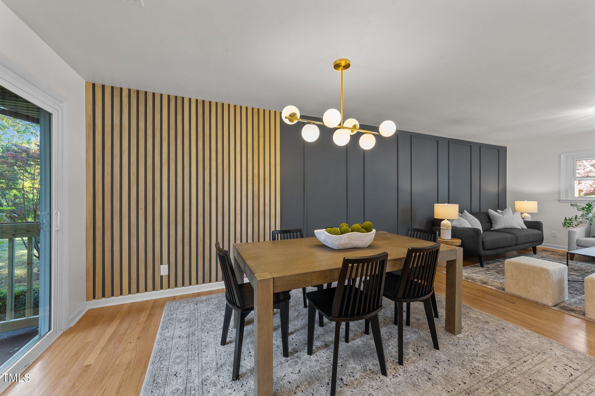 4601 Forestdale Road Raleigh, NC 27603 - Photo 9 of 46 a view of a dining room with furniture