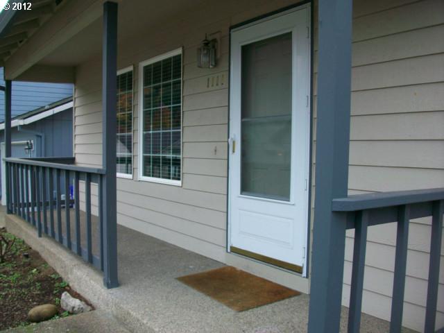 1111 Southwest Ivory Loop Gresham, OR 97080 - Photo 3 of 8 a view of front door