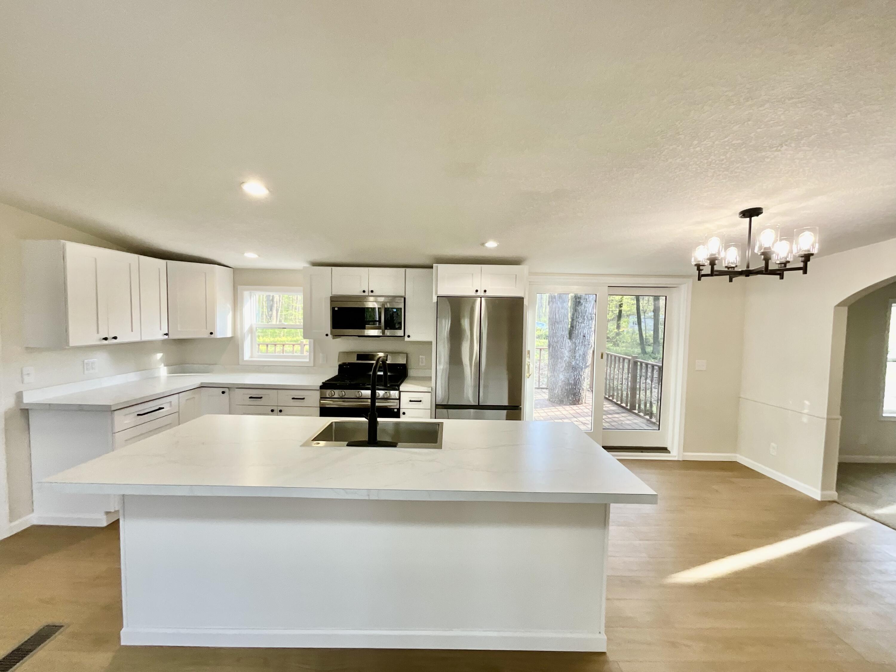 6249 East Tamarack Road Vestaburg, MI 48891 - Photo 4 of 26 Center Island with Snack Bar Seating
