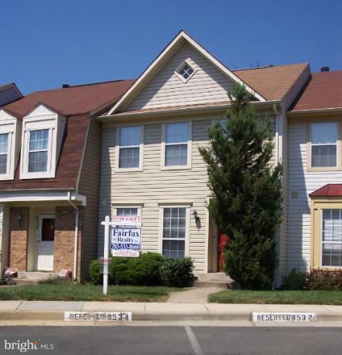 8532 Bauer Drive Springfield, VA 22152 - Photo 1 of 12 a front view of a house with a yard