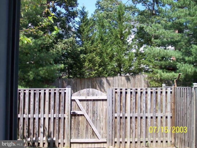 8532 Bauer Drive Springfield, VA 22152 - Photo 12 of 12 a view of a wooden fence