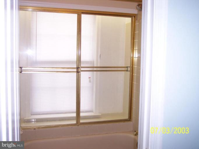 8532 Bauer Drive Springfield, VA 22152 - Photo 9 of 12 a view of a bathroom with a shower