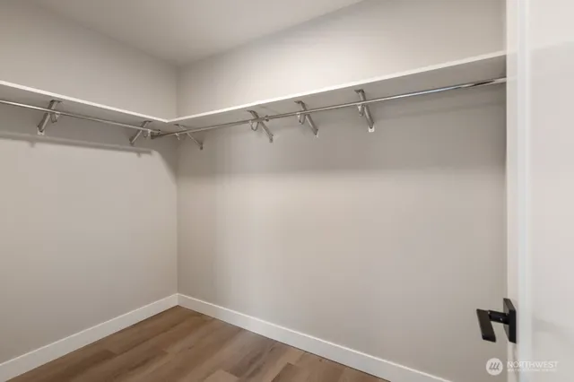 a view of a room with shelf on the wall