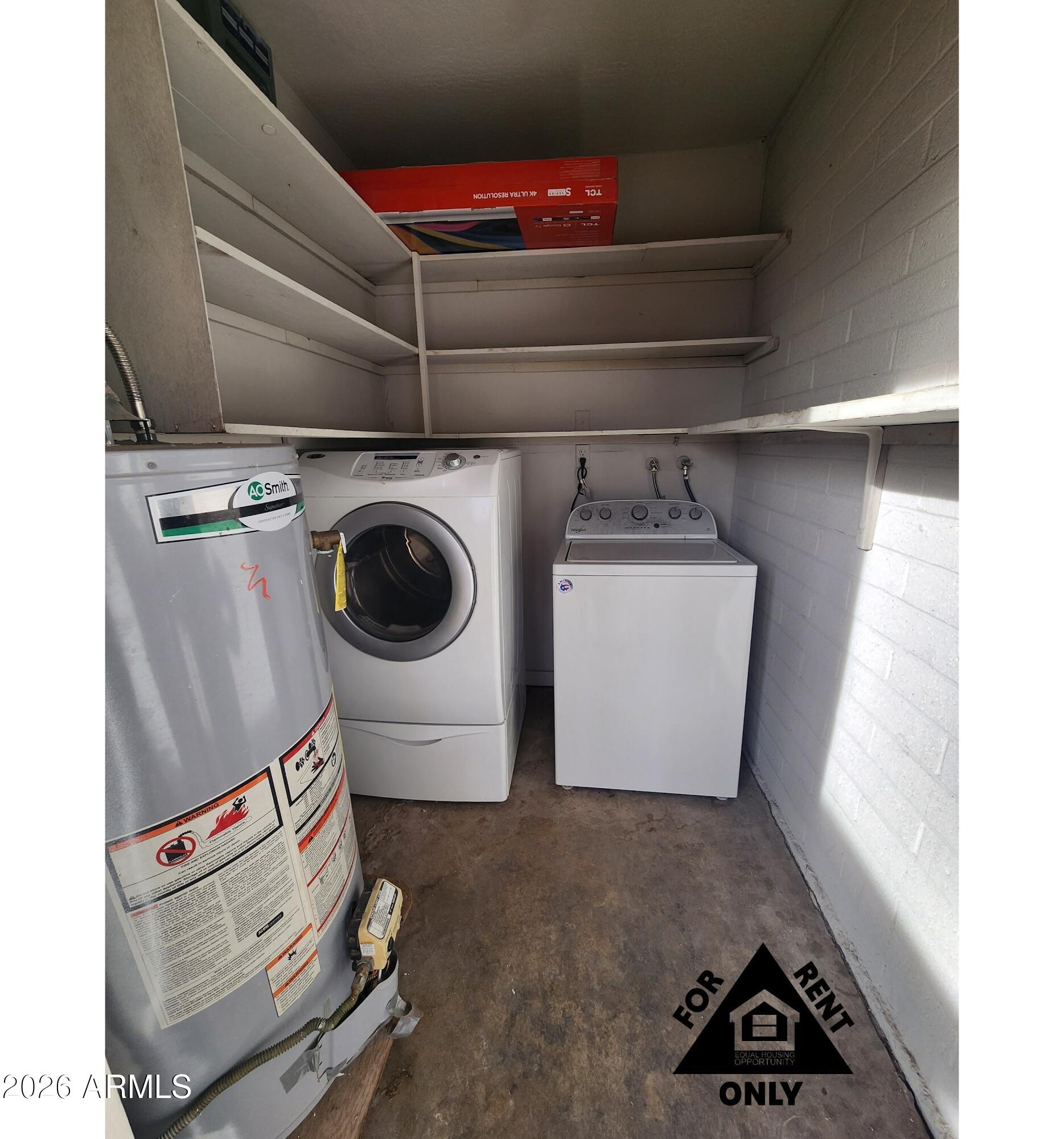 2001 West Turney Avenue, Unit 6 Phoenix, AZ 85015 - Photo 9 of 10 a utility room with dryer and washer