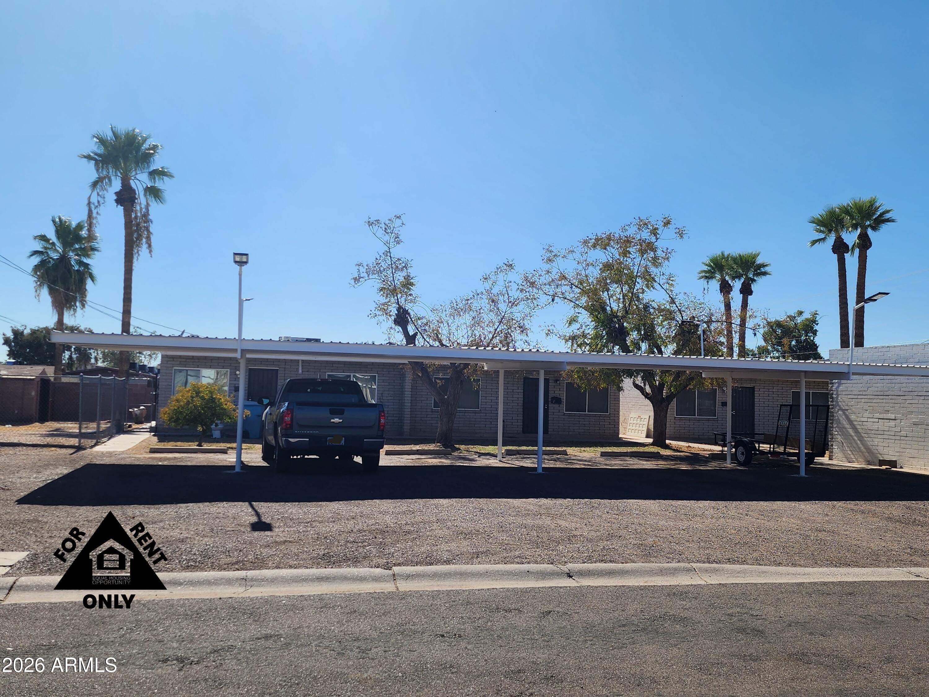 2001 West Turney Avenue, Unit 6 Phoenix, AZ 85015 - Photo 10 of 10 a car parked on the side of the road