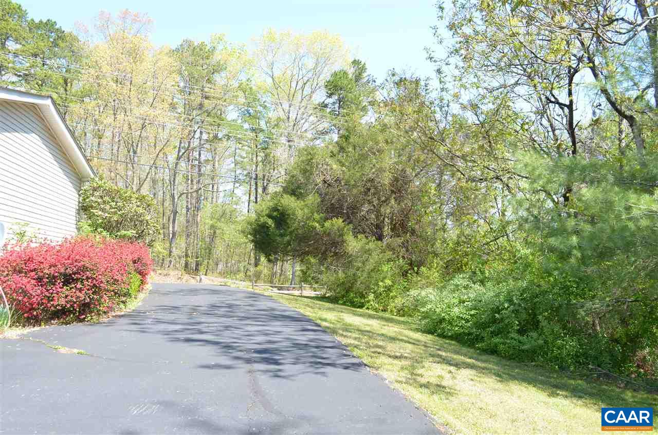 74 Begonia Road Ruckersville, VA 22968 - Photo 15 of 17 a view of a street with a trees