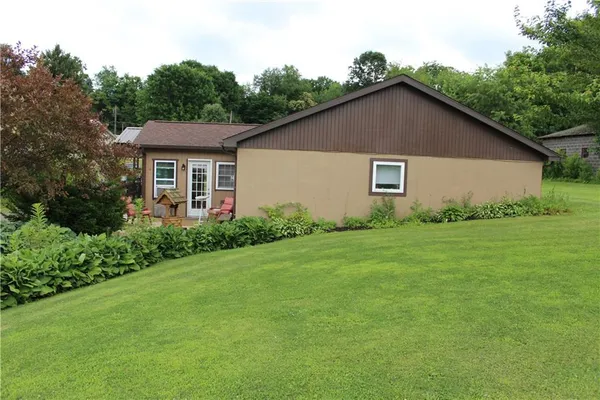 a house that has a lot of plants in it