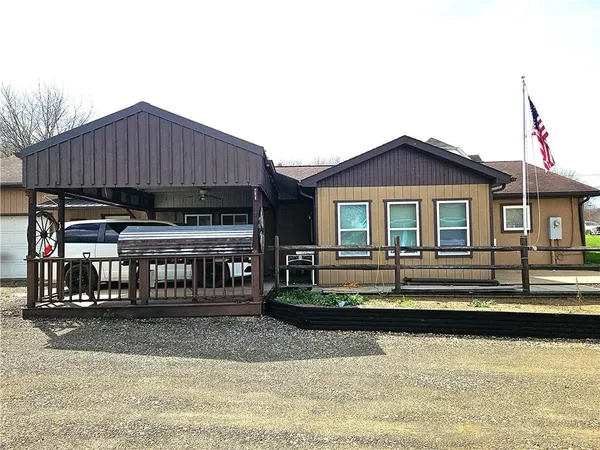 a front view of a house with a balcony