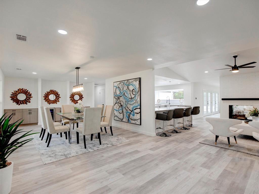 9918 Ila Drive Dallas, TX 75220 - Photo 1 of 1 a view of a dining room with furniture and wooden floor