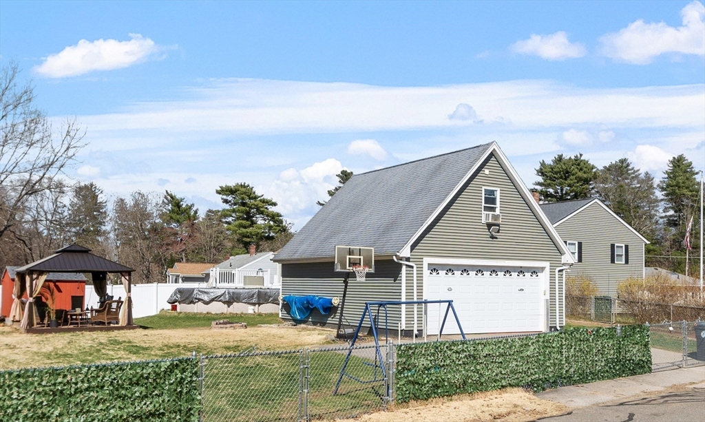 53 Laurel Hill Road Southbridge, MA 01550 - Photo 17 of 28 a view of a house next to a yard