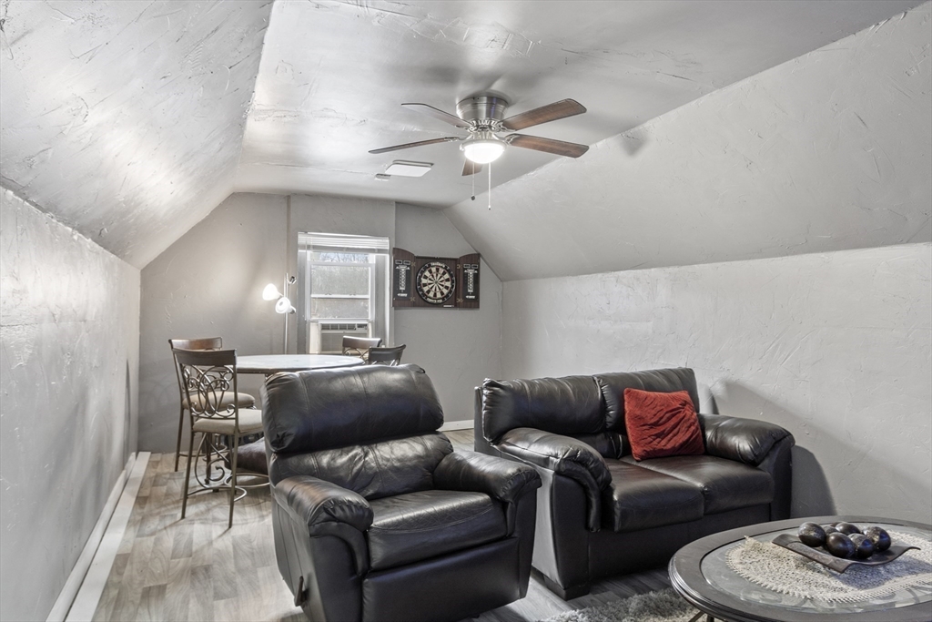 53 Laurel Hill Road Southbridge, MA 01550 - Photo 19 of 28 a living room with furniture and a mirror