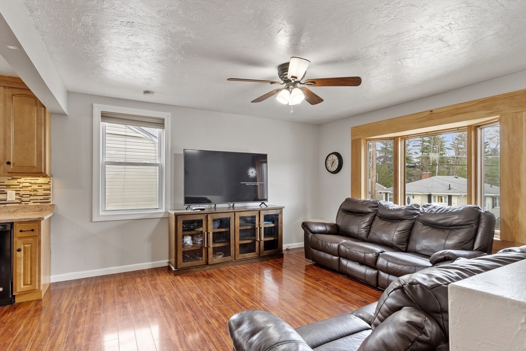 53 Laurel Hill Road Southbridge, MA 01550 - Photo 2 of 28 a living room with furniture and a flat screen tv