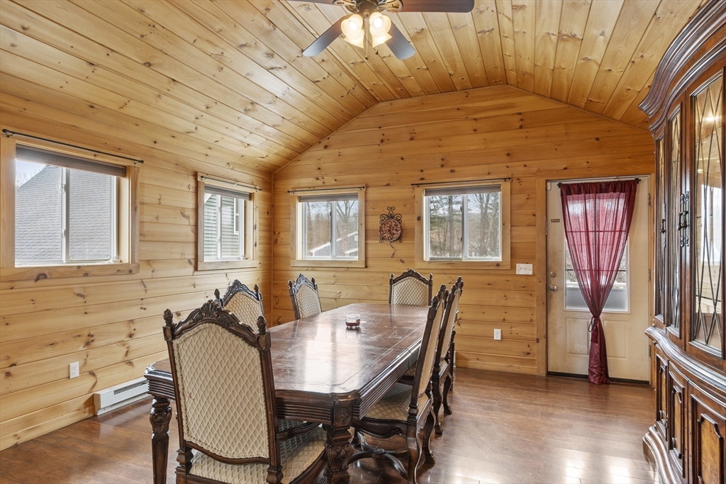 53 Laurel Hill Road Southbridge, MA 01550 - Photo 6 of 28 a view of a dining room with furniture and wooden floor