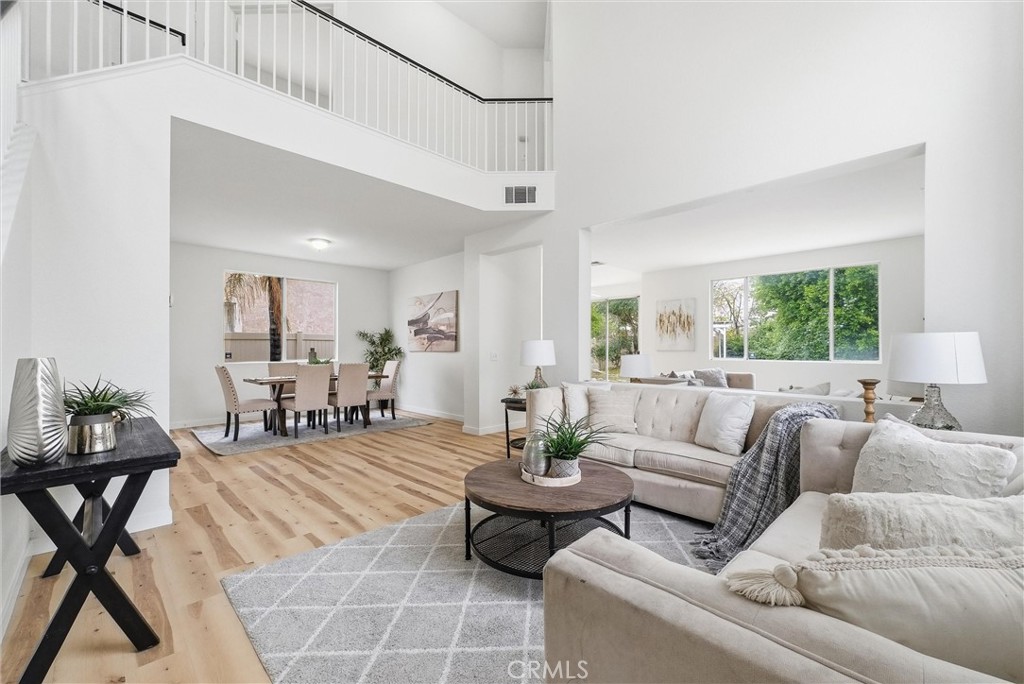7522 Calais Court Rancho Cucamonga, CA 91730 - Photo 4 of 20 a living room with furniture and a large window