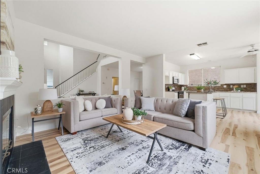7522 Calais Court Rancho Cucamonga, CA 91730 - Photo 6 of 20 a living room with furniture and view of kitchen