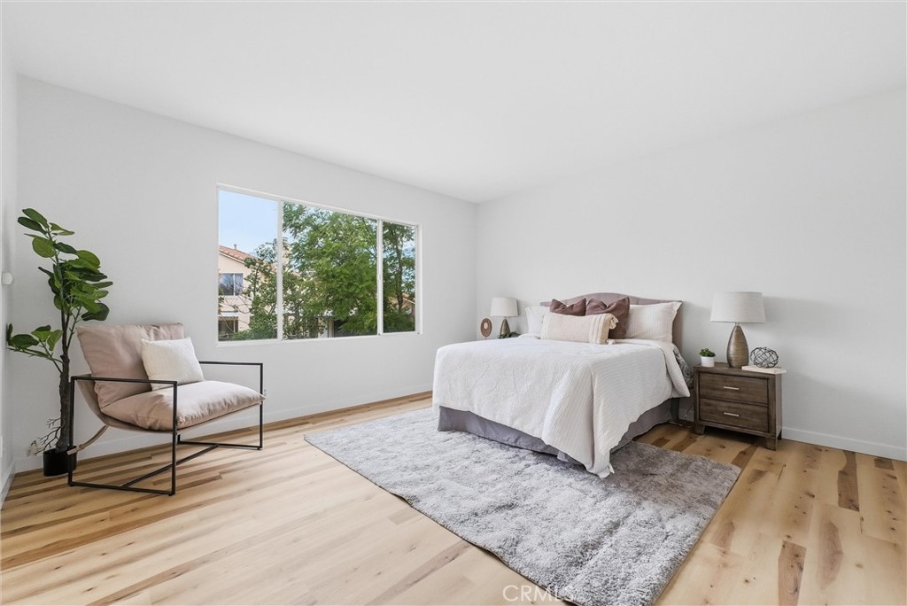 7522 Calais Court Rancho Cucamonga, CA 91730 - Photo 10 of 20 a bedroom with a bed and a window