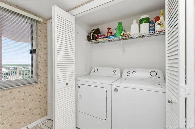 a utility room with dryer and washer