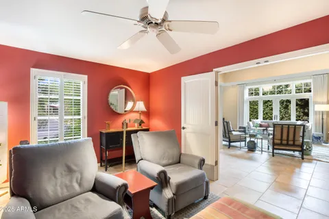 a view of a backyard with sitting area