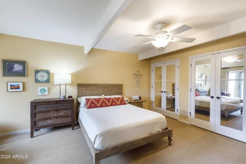 a bed room with a bed and a couch