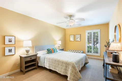 a bathroom with a shower and a toilet