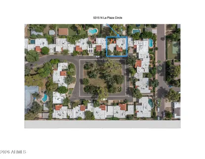 a view of swimming pool with yard