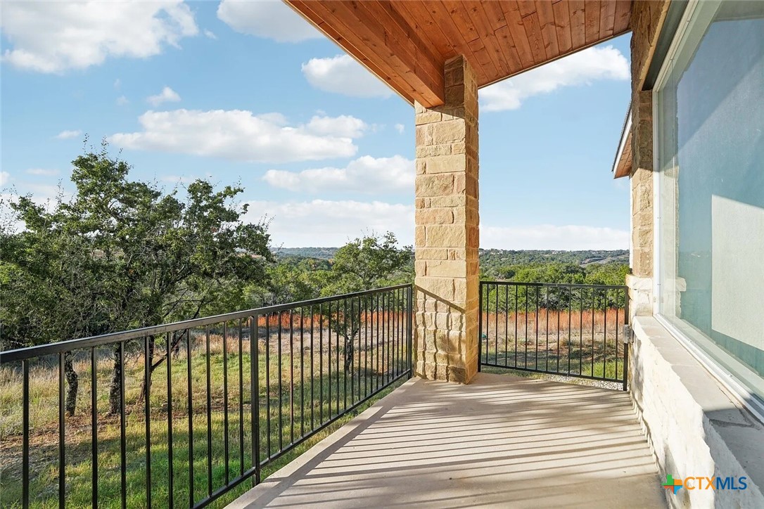 289 Star Grass, Unit 3 Spring Branch, TX 78070 - Photo 34 of 40 a view of a city from a balcony