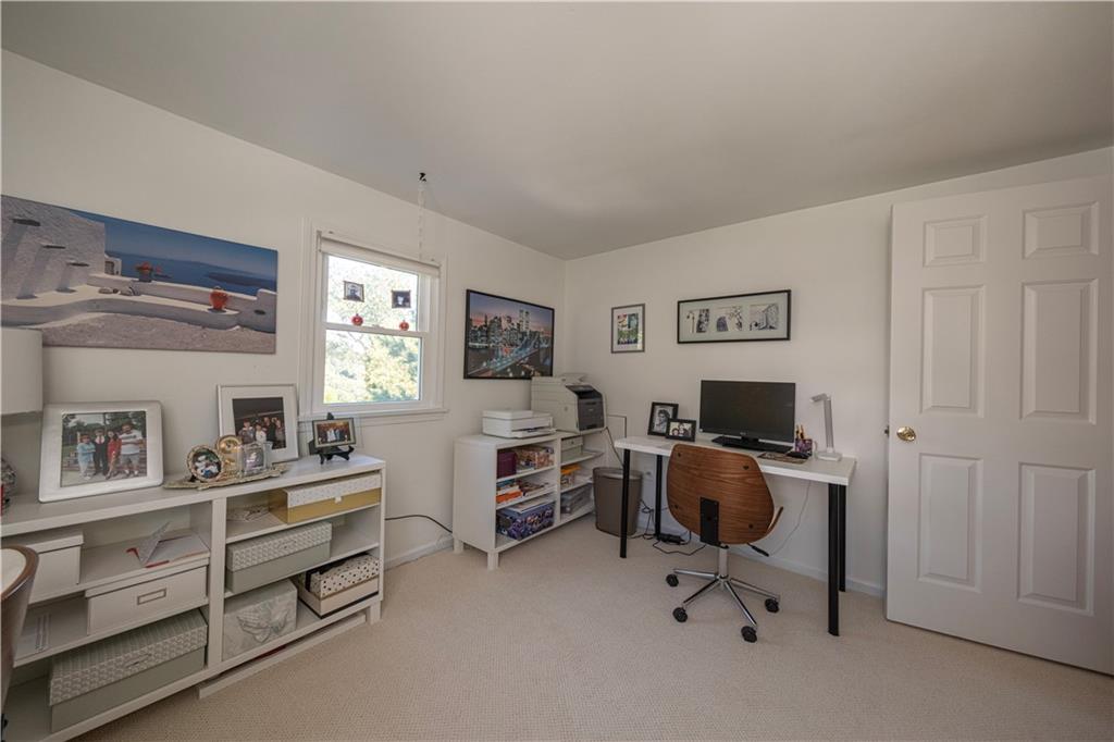 67 Ridge Road Pittsburgh, PA 15221 - Photo 12 of 37 a view of a workspace with furniture and a window