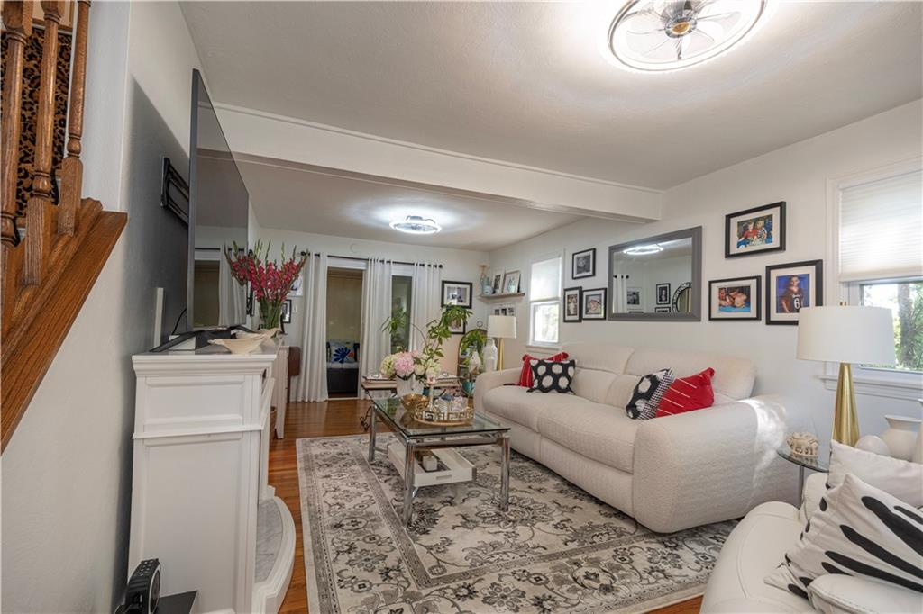 67 Ridge Road Pittsburgh, PA 15221 - Photo 2 of 37 a living room with furniture and a flat screen tv