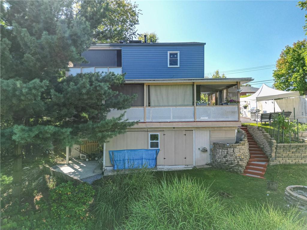 67 Ridge Road Pittsburgh, PA 15221 - Photo 36 of 37 a view of a house with a yard