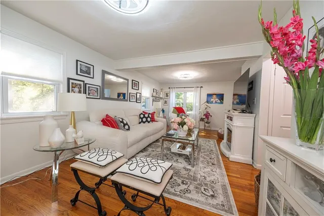 a bed room with furniture and a window