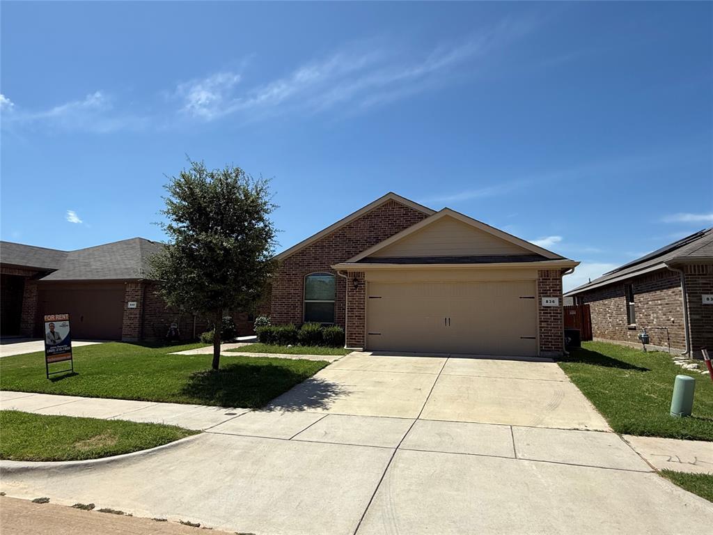 a front view of house with yard