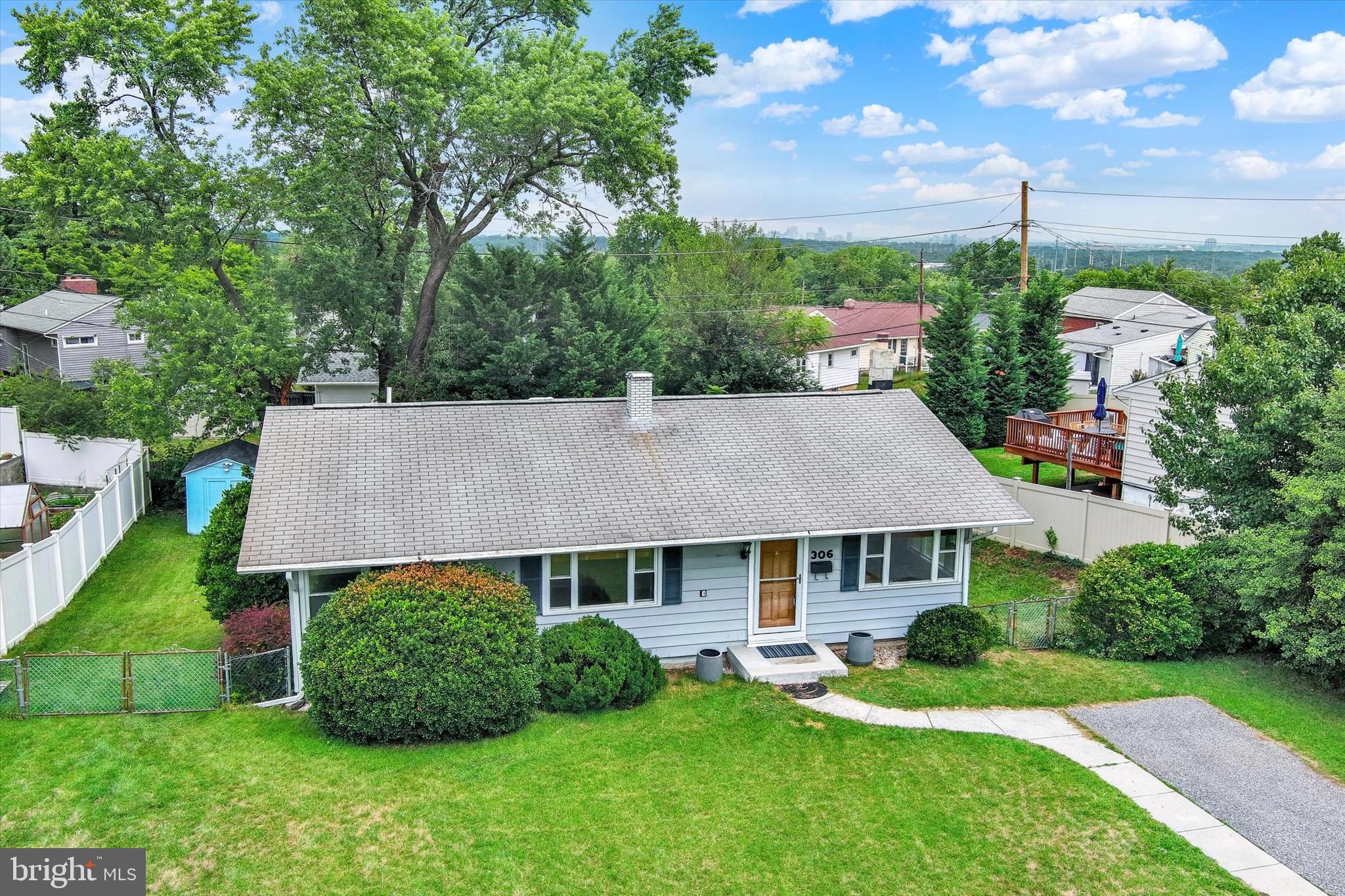 306 Regency Circle Linthicum Heights, MD 21090 - Photo 55 of 73 Classic rancher with a green lawn.