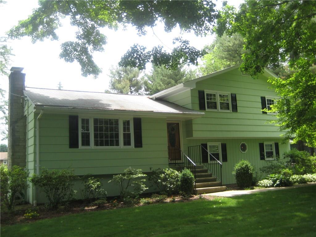 60 Magnolia Road Trumbull, CT 06611 - Photo 1 of 1 a view of a house with a yard and plants