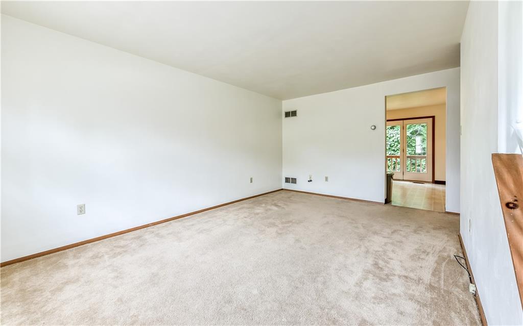 515 Barclay Avenue Pittsburgh, PA 15221 - Photo 3 of 14 an empty room with windows