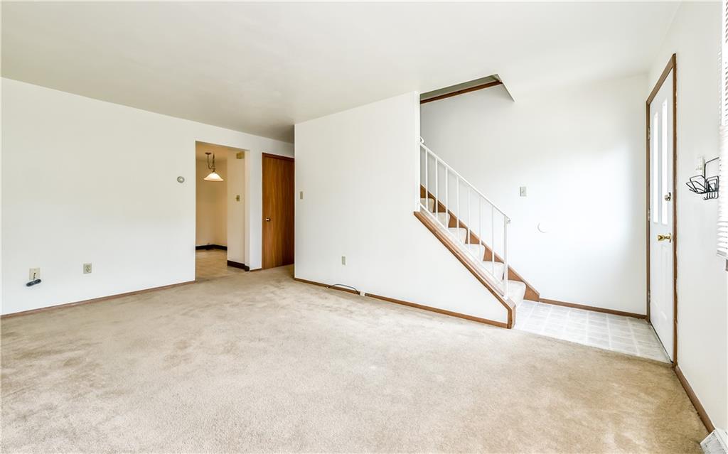 515 Barclay Avenue Pittsburgh, PA 15221 - Photo 4 of 14 a view of an empty room with stairs